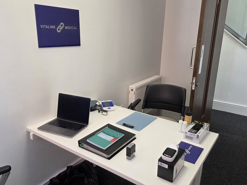 Medical consultation room at Vitalink Medical in Bolton for pre-employment medicals and occupational health assessments.